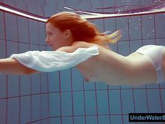 VidsPlus presents: Redhead in a white dress and sexy bikini