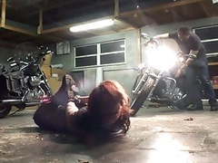 VidsPlus presents: Biker girl hogtied in the garage