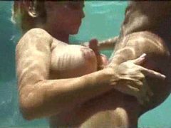 VidsPlus presents: Chick swallows his cock underwater