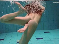VidsPlus presents: Underwater with a busty naked babe as she swims