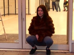 VidsPlus presents: Public cameltoe and pissing show from a girl in fur
