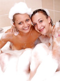 Vids Plus presents: Naughty sexy young chicks taking a hot bubble bath together