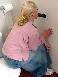 Vids Plus presents: Blonde girl Jamie sits on the toilet and blows a black gloryhole dong